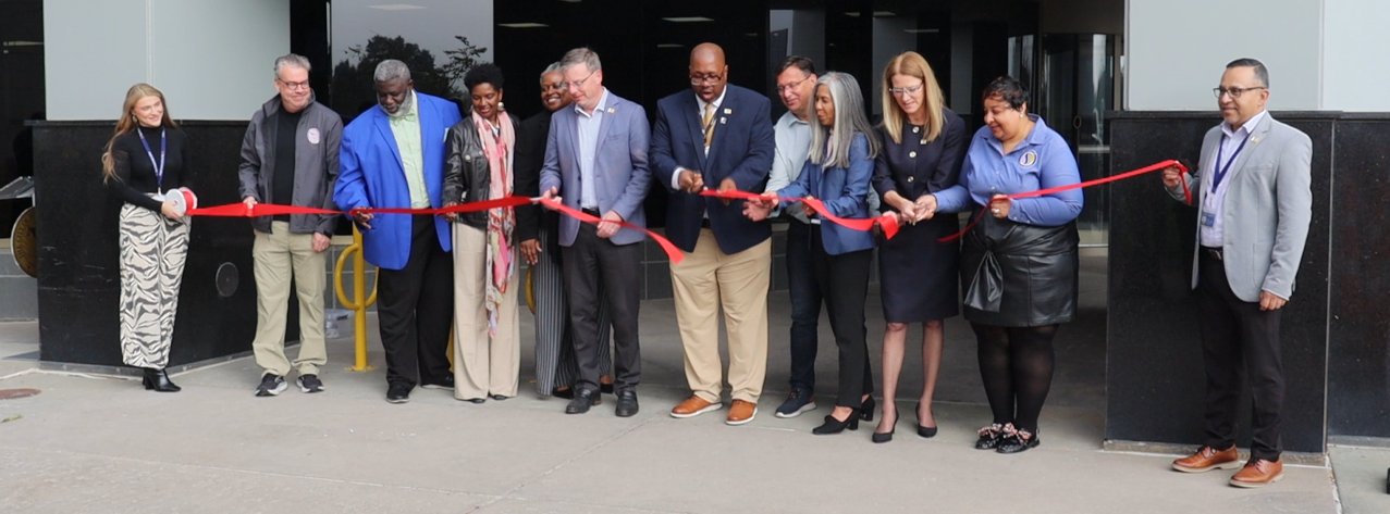 City of South Bend officials cut a red ribbon