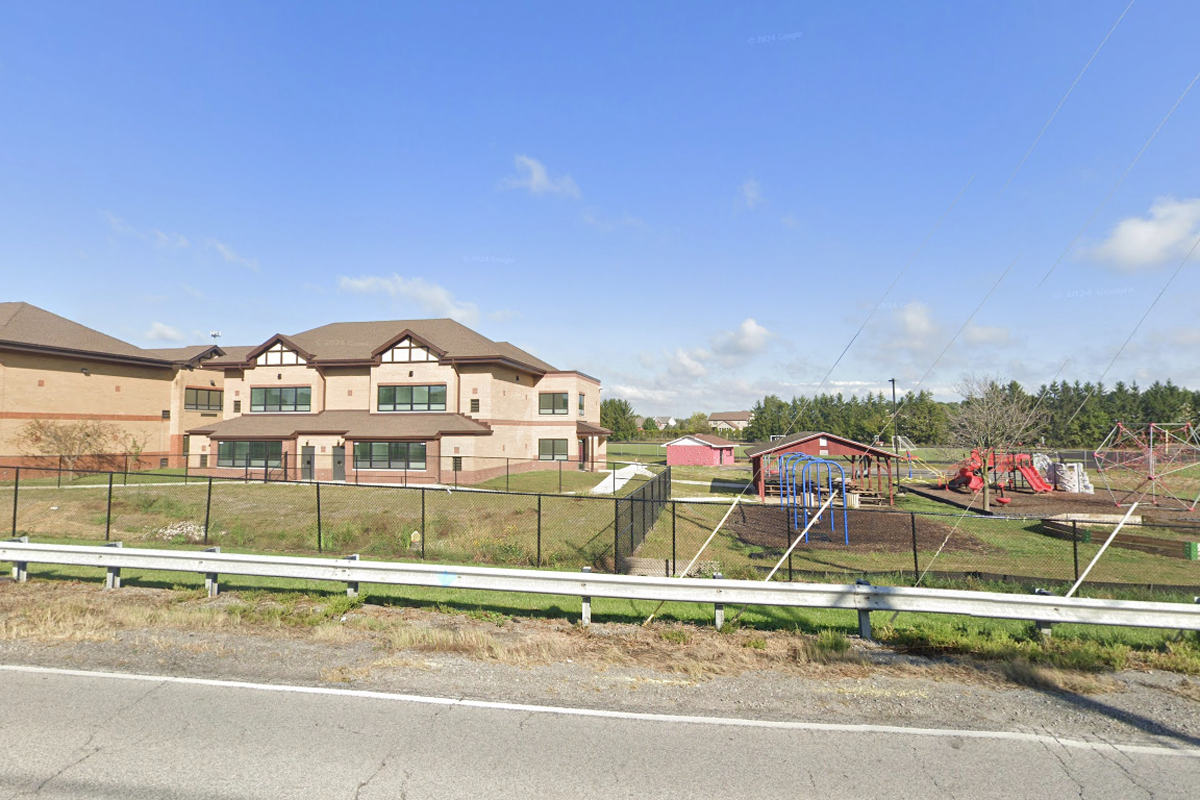Two-story elementary school building and playground