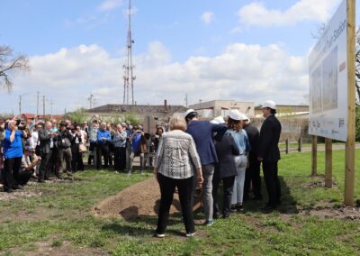 A crowd watches as officials break ground at the Downtown Hammond Train Station groundbreaking event