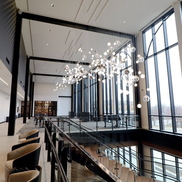 Public and institutional, interior of theater featuring wood beams and artistic lighting